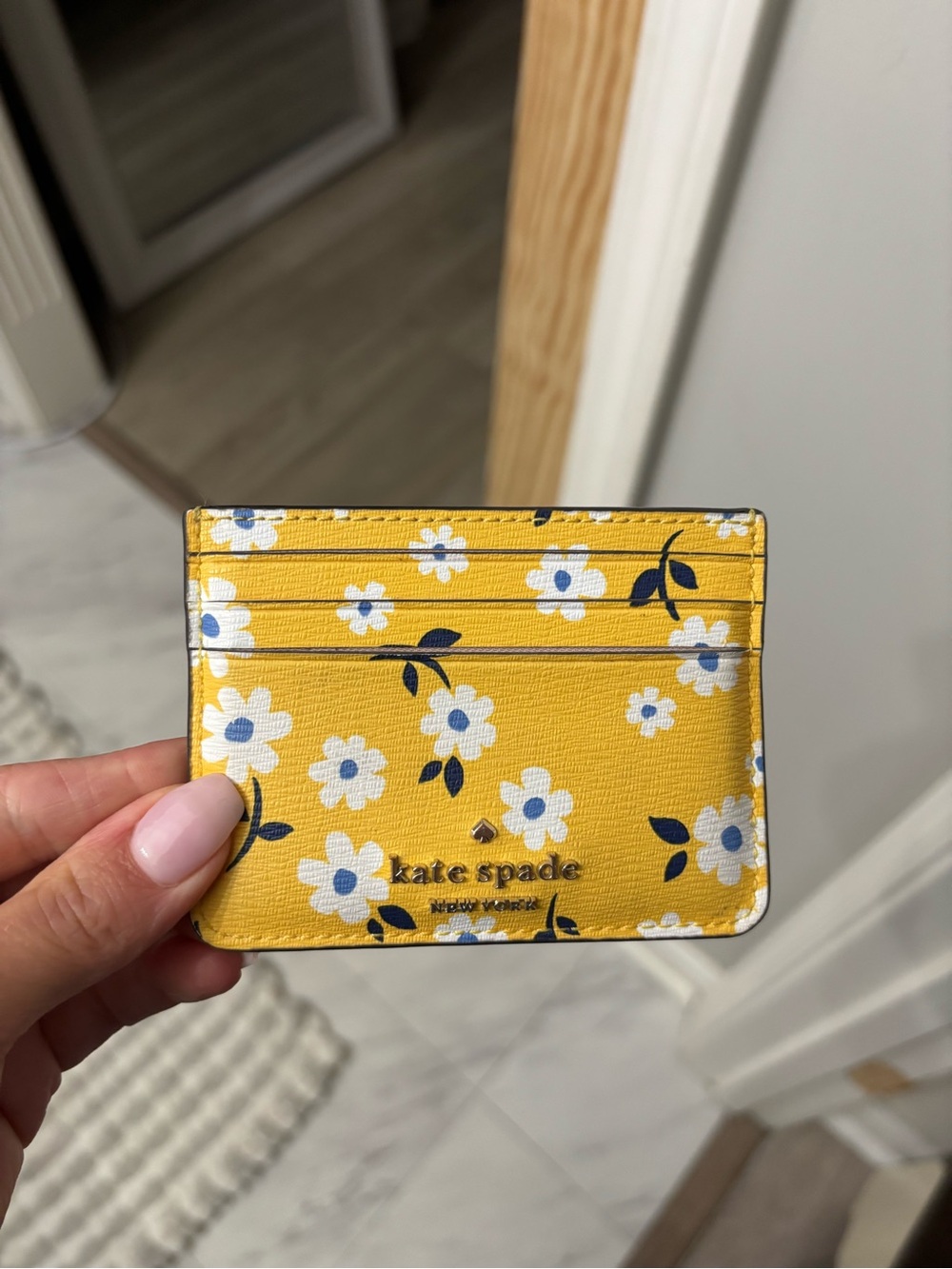 kate spade Yellow Floral Card Case with White Daisies